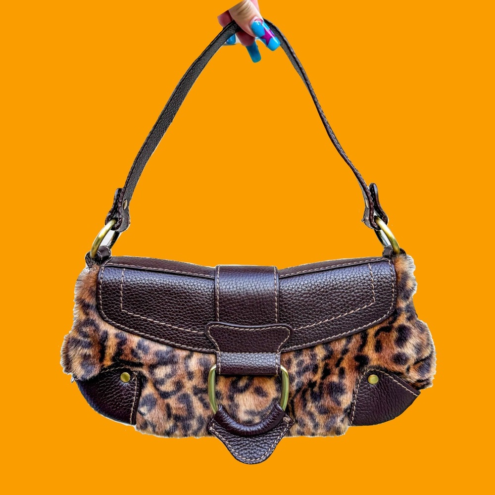 SOLD
Leopard print Valerie Steven’s baguette bag!
